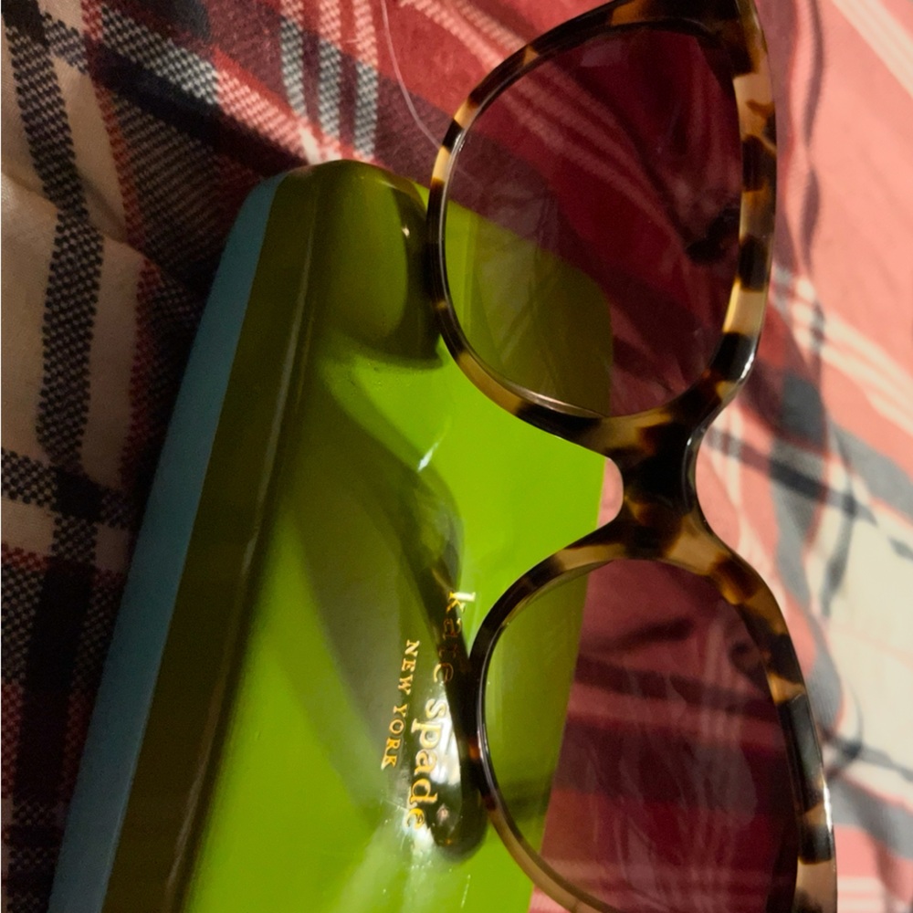 Brand new Kate Spade Tortoise Sunglasses. Never worn. Comes with original case.